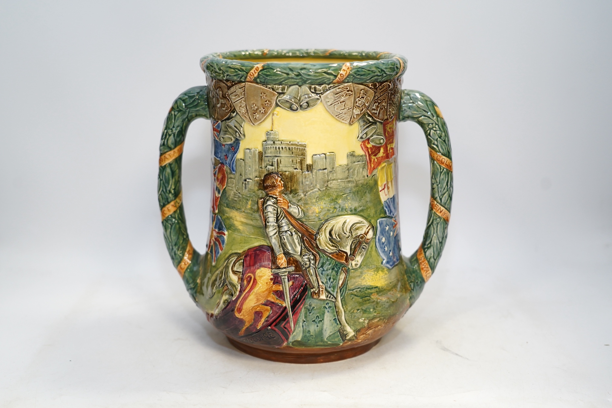 A Doulton limited edition commemorative loving cup, George V and Mary silver jubilee, 804/1000, 26cm. Condition - fine crazing to glaze, good